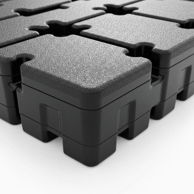 Gros plan sur un plot modulaire Big Foot en caoutchouc recyclé